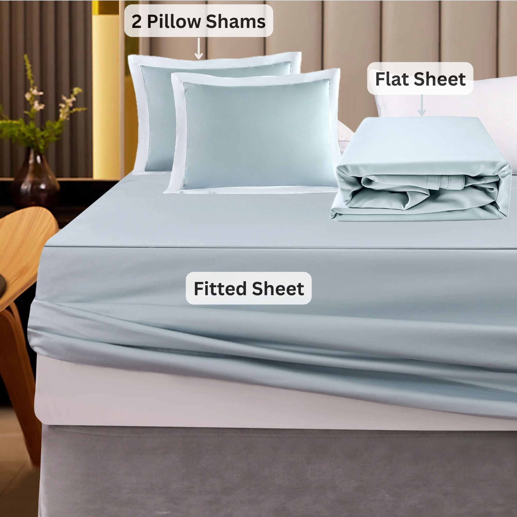 Bedding set with fitted sheet, flat sheet, and 2 pillow shams.