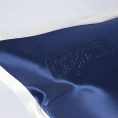 The Cotton & Silk Logo On the Navy Blue + Cream Pillow Sham